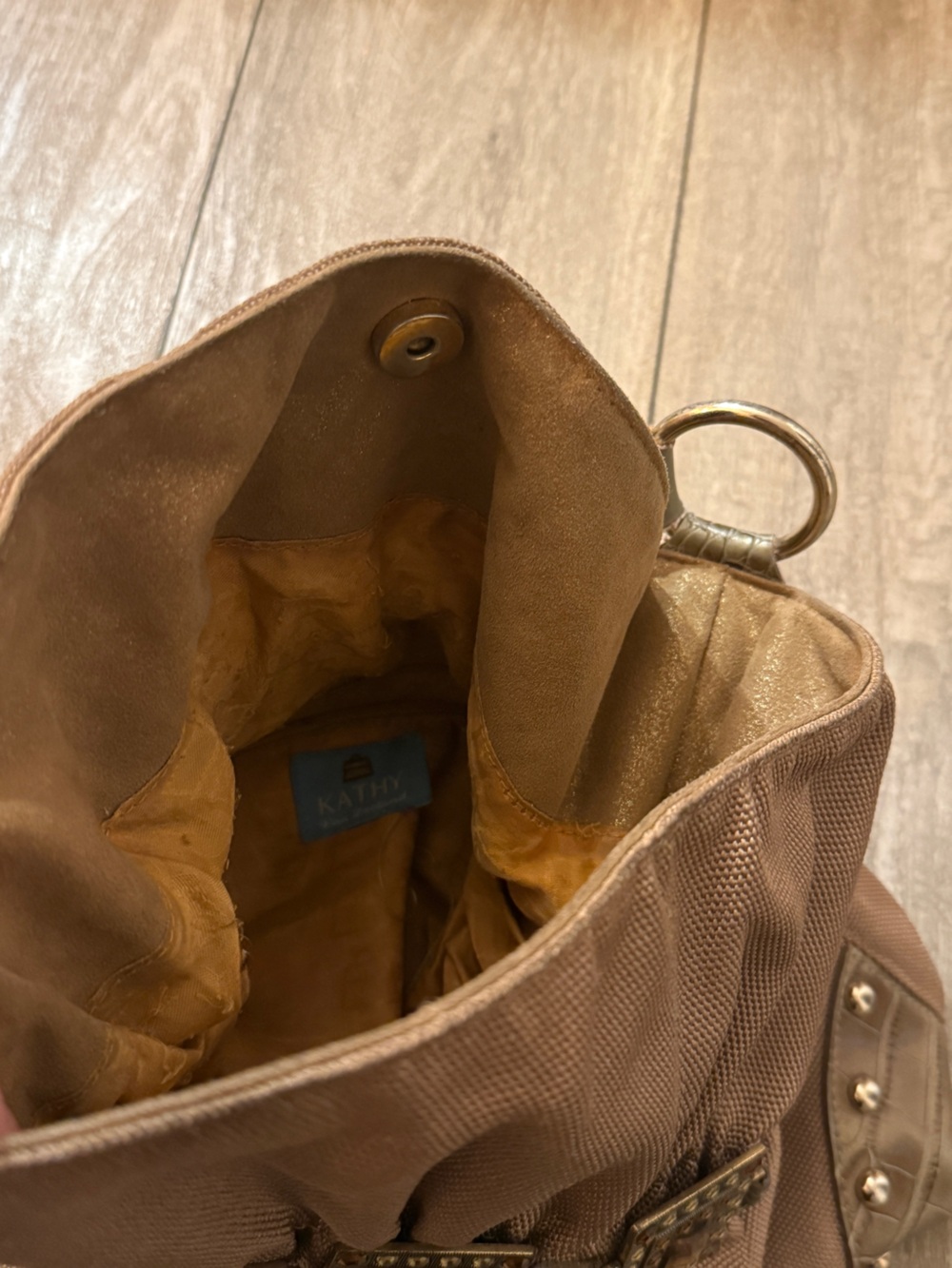 Kathy Van Zeeland beige studded messenger bag